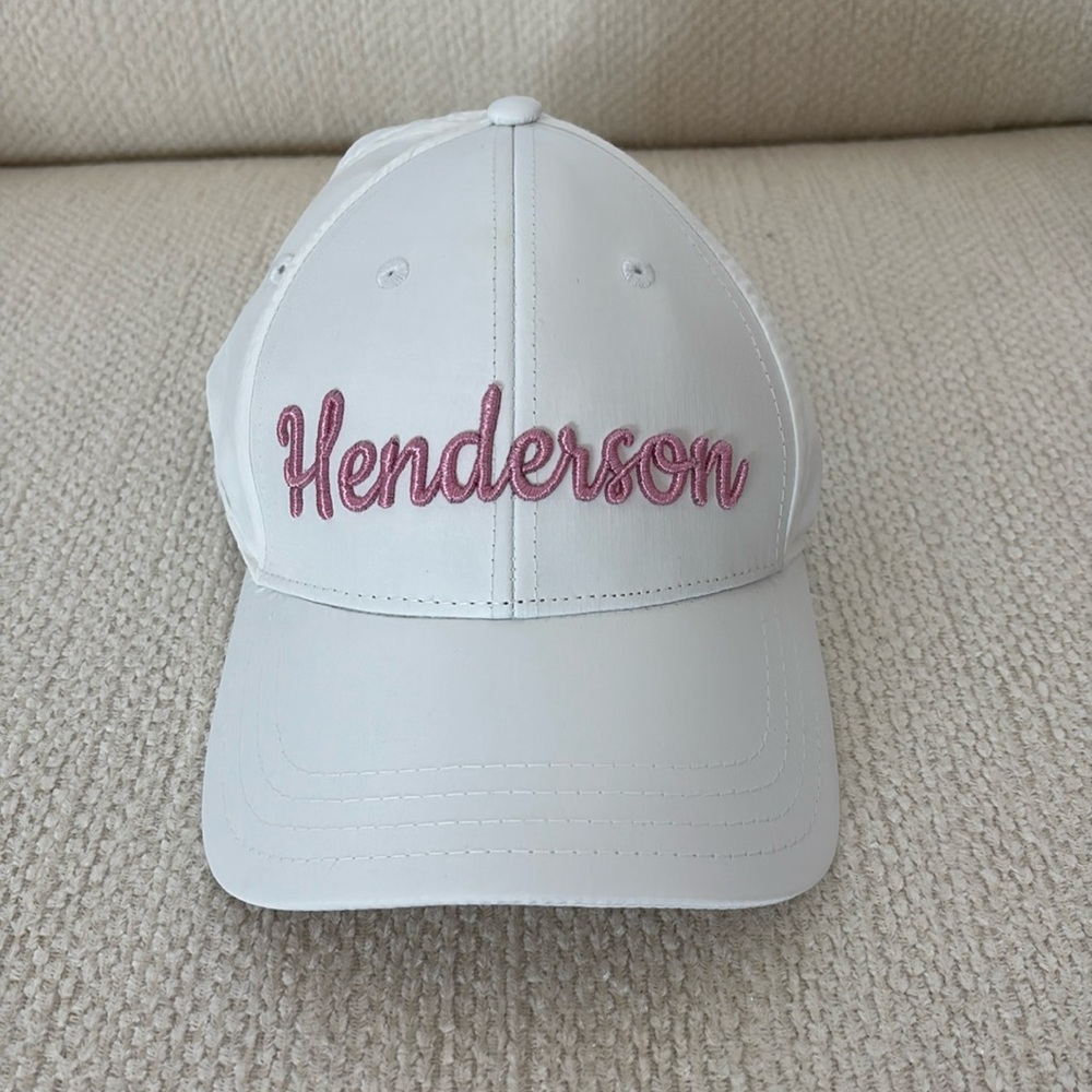 The Henderson resort & spa Destin Florida white and pink baseball hat cap